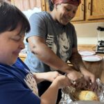 IMG_5158 DSP assists resident with cooking skills