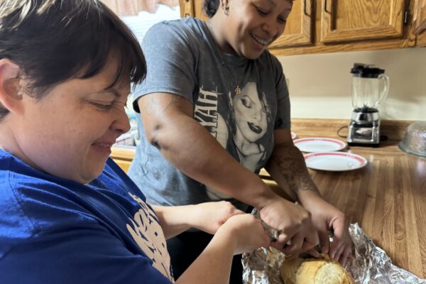 DSP assists resident with cooking skills