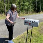 Kate checking mail group home idd